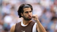 Carlos Alcaraz of Spain reacts in his match against Yibing Wu of China during their Men's Singles Third Round match on Day Six of the 2026 US Open at USTA Billie Jean King National Tennis Center on September 04, 2026 in the Flushing neighborhood of the Queens borough of New York City. (Photo by Julian Finney/AFP)