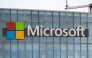 This photograph shows a view of Microsoft's logo on the company's French headquarters in Issy-les-Moulineaux on the outskirts of Paris on January 6, 2025. (Photo by Martin LELIEVRE / AFP)