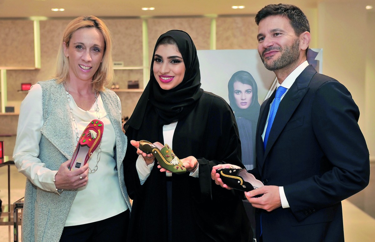 From left: Palma Libotte, Chairperson of Italian Chamber of Commerce in Qatar; Hissa Al Haddad, Qatari shoe designer; and Pasquale Salzano, Ambassador of Italy to Qatar, during the launch, yesterday. PIC: Baher Amin / The Peninsula