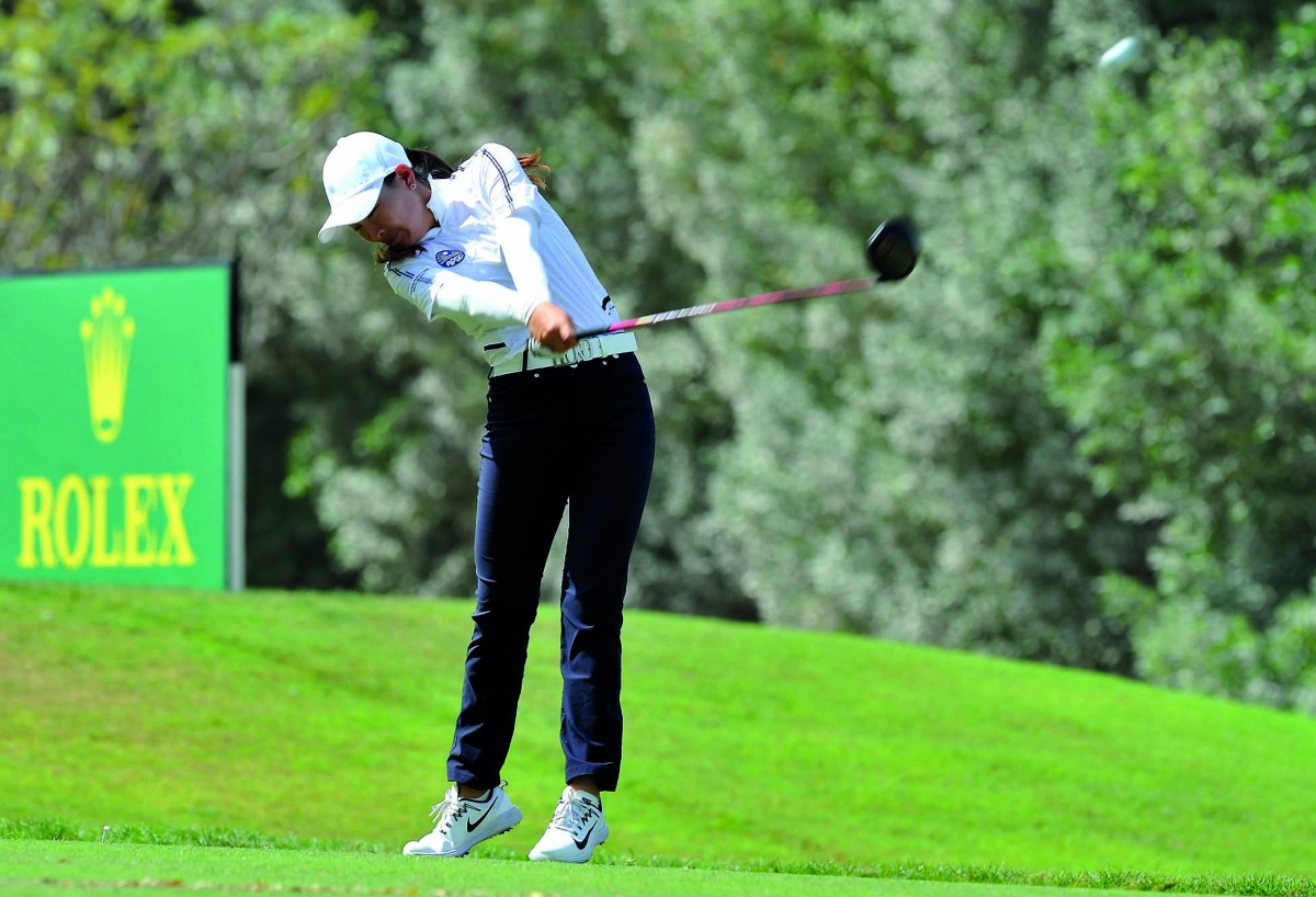 A player from the Asia-Pacific team in action at the Patsy Hankins Trophy 2018 at Doha Golf Club yesterday. Photo: Kammutty VP/THE PENINSULA