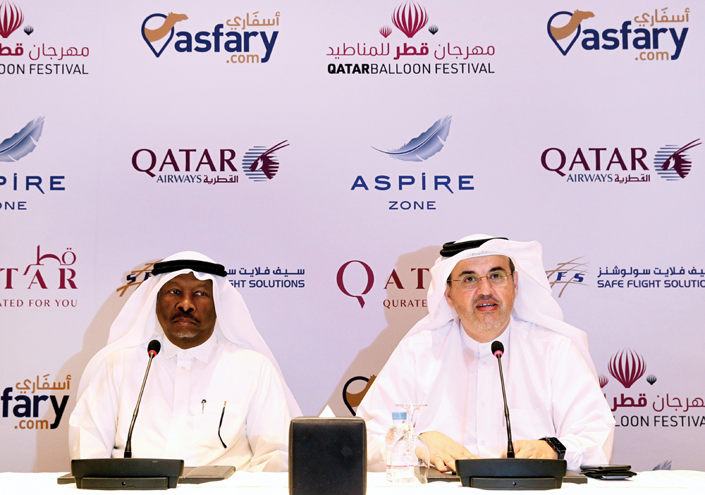 Captain Hassan Al Mousawi (right), CEO of Safe Flight Solutions, and Abdulla Aman Al Khater, Director of Events and Facilities at Aspire Zone Foundation, addressing the media on the upcoming Qatar Hot Air Balloon Festival, at The Torch Doha, yesterday.  P
