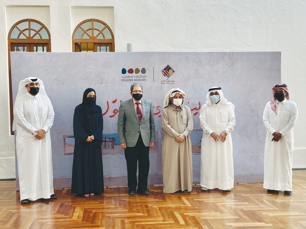 Dr. Hafez Ali (left), Msheireb Museums Director, Qatari artist Youssef Ahmed (third right) and other officials at the launch of “When I Remember the Past” exhibition book yesterday at Msheireb Museums.