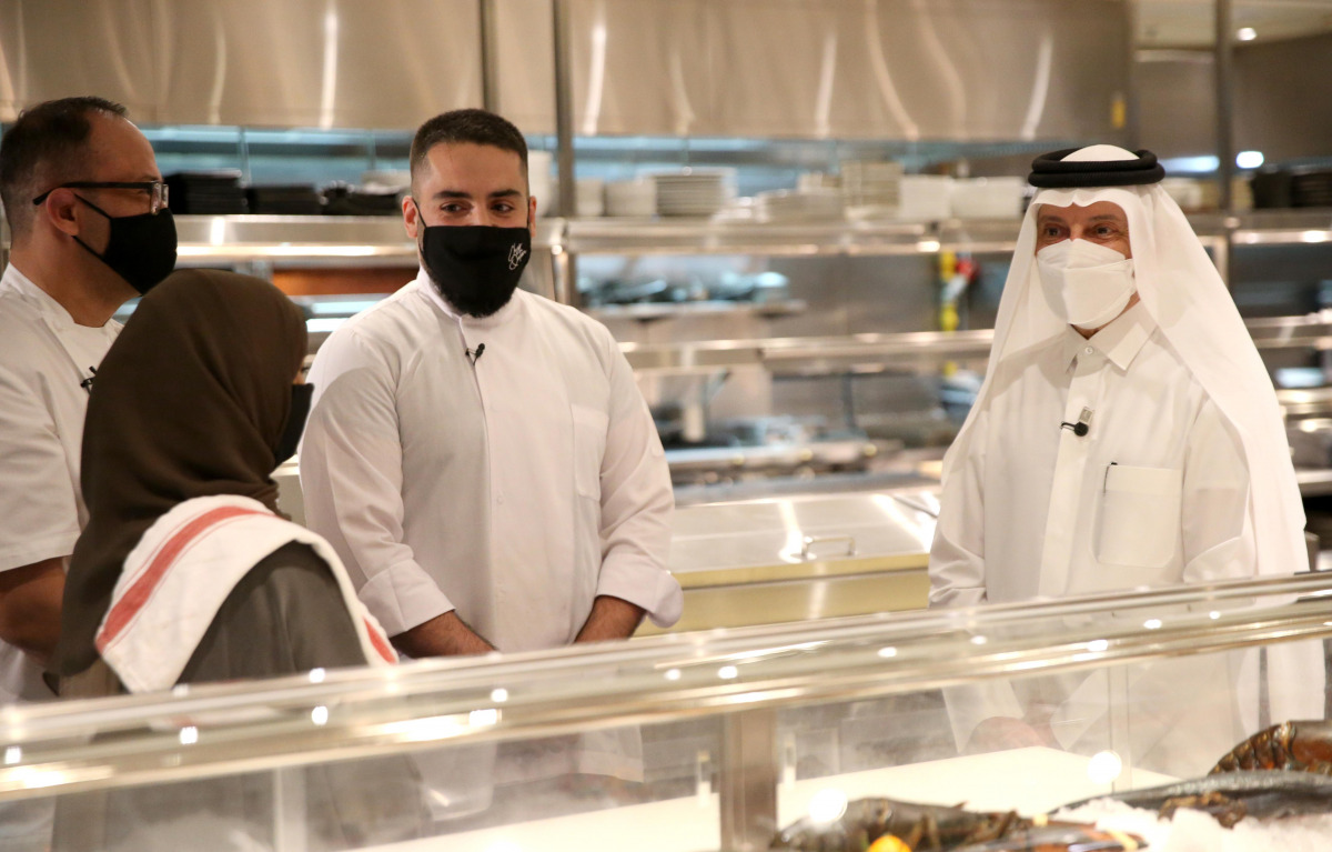 Qatar National Tourism Council Secretary General Akbar Al Baker with some of the participating chefs.